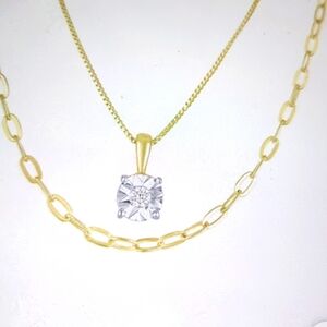 Gold and Silver Necklace Set with Dazzling Pendant and Chain Link Design.